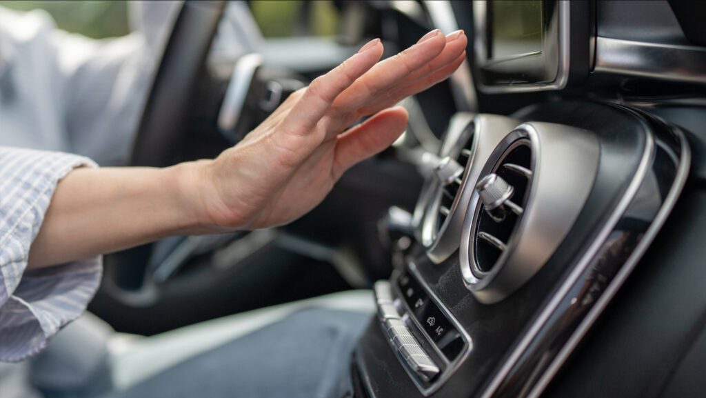 AC Repair in Northbrook for drivers dealing with a car air conditioner blowing warm air or hot instead of cold during summer