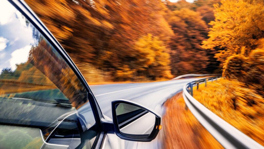 Technician performing a fall brake inspection in Northbrook to prepare for wet, leaf-covered roads