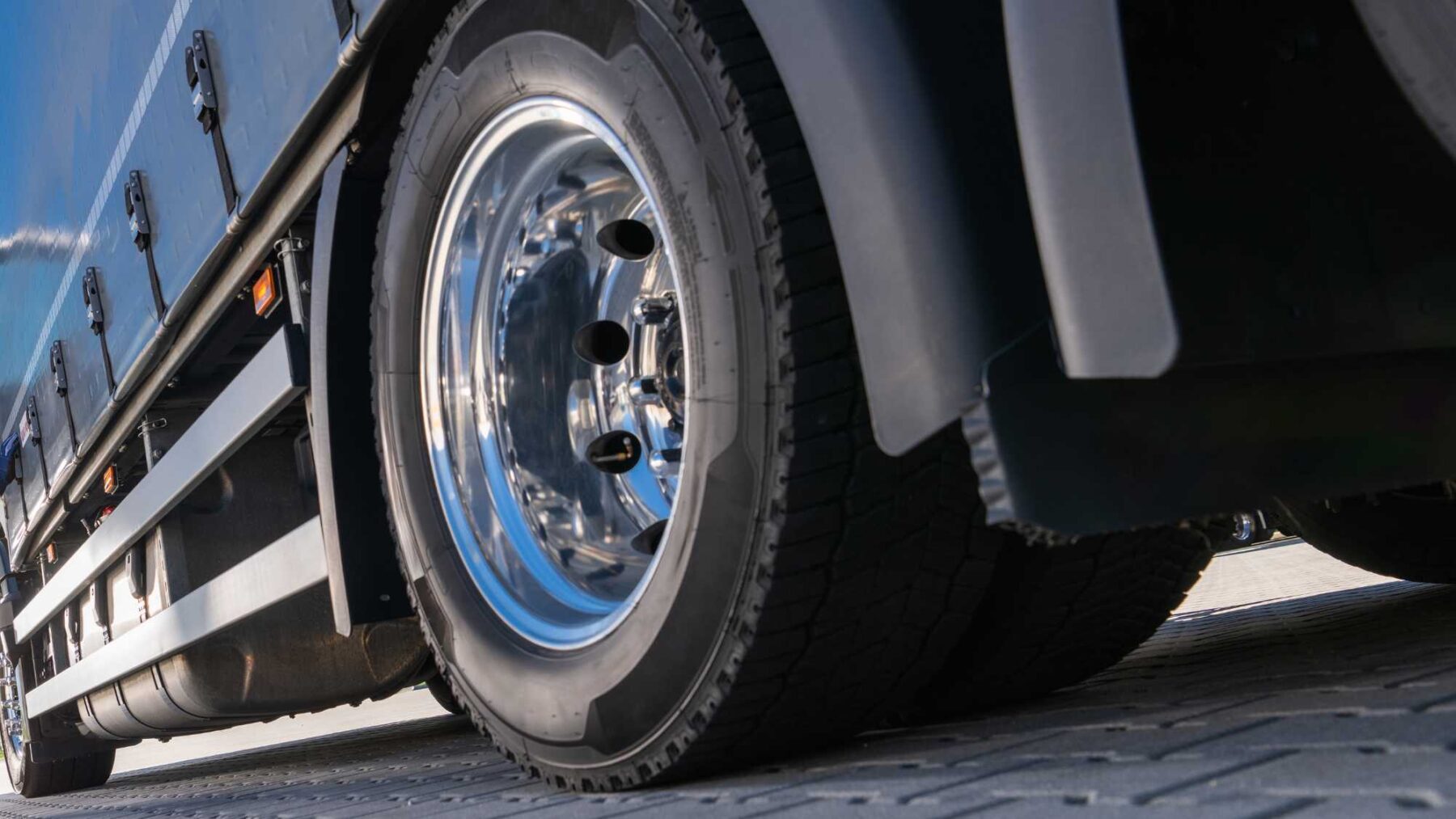 close-up of SUV and truck tires showing larger tread and sidewall differences