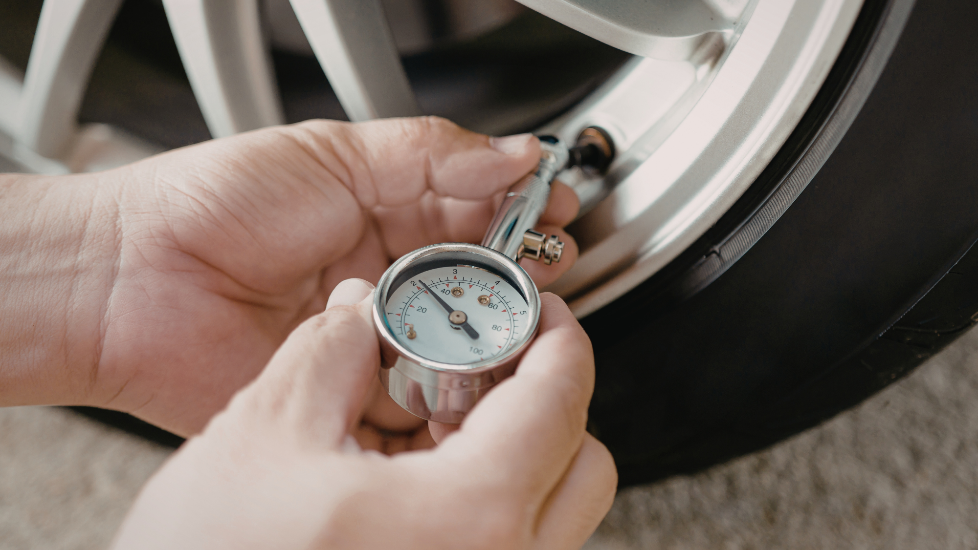 TPMS dashboard warning light showing low tire pressure in a vehicle