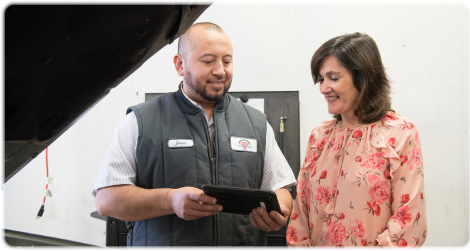 Mechanic helping customer