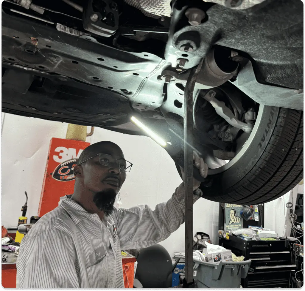 Mechanic checking tire