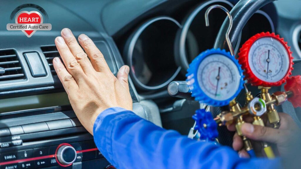 mechanic inspecting car AC system in Libertyville shop