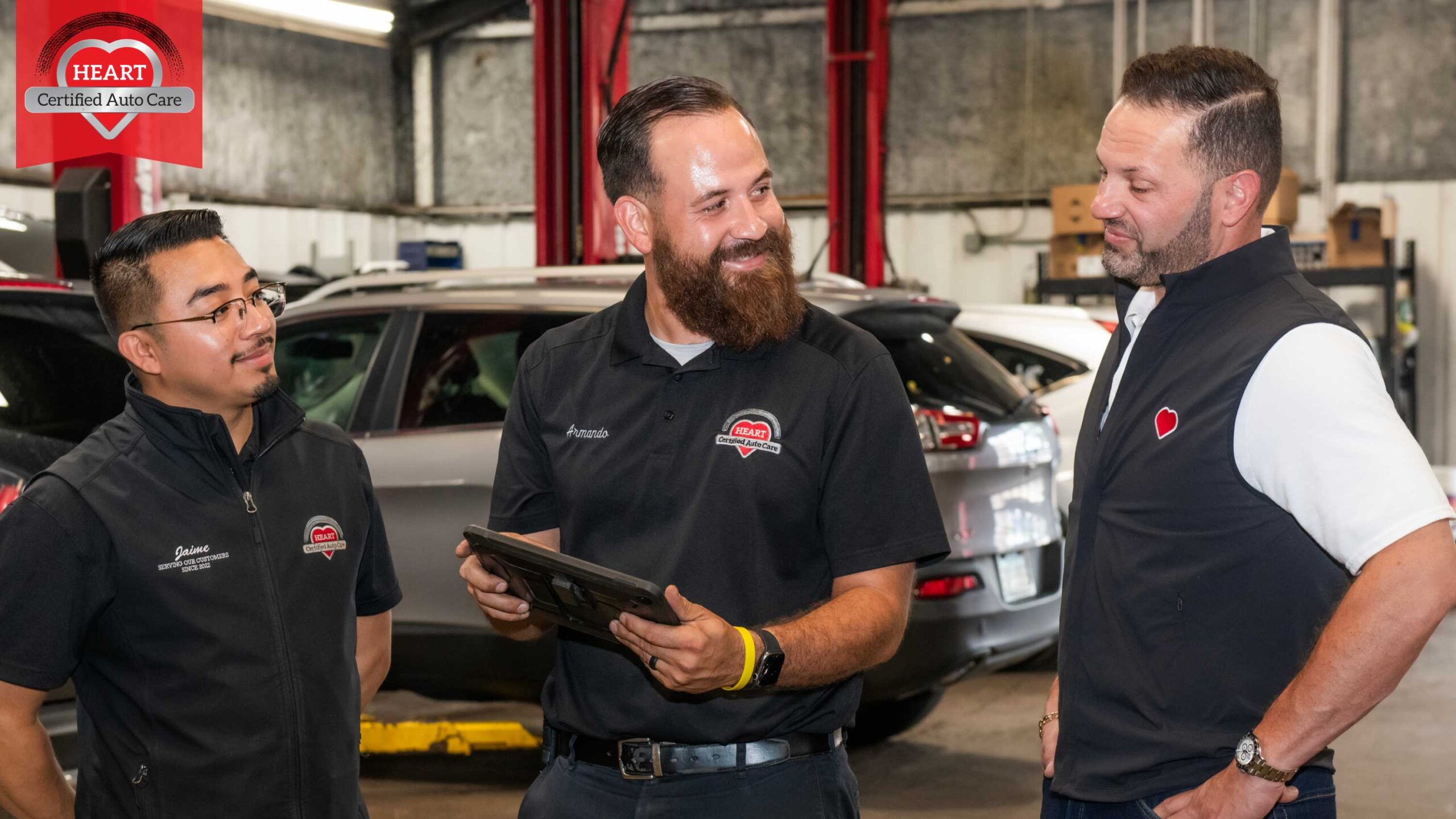 Honest auto repair shop inspection with technician showing photos in Libertyville IL