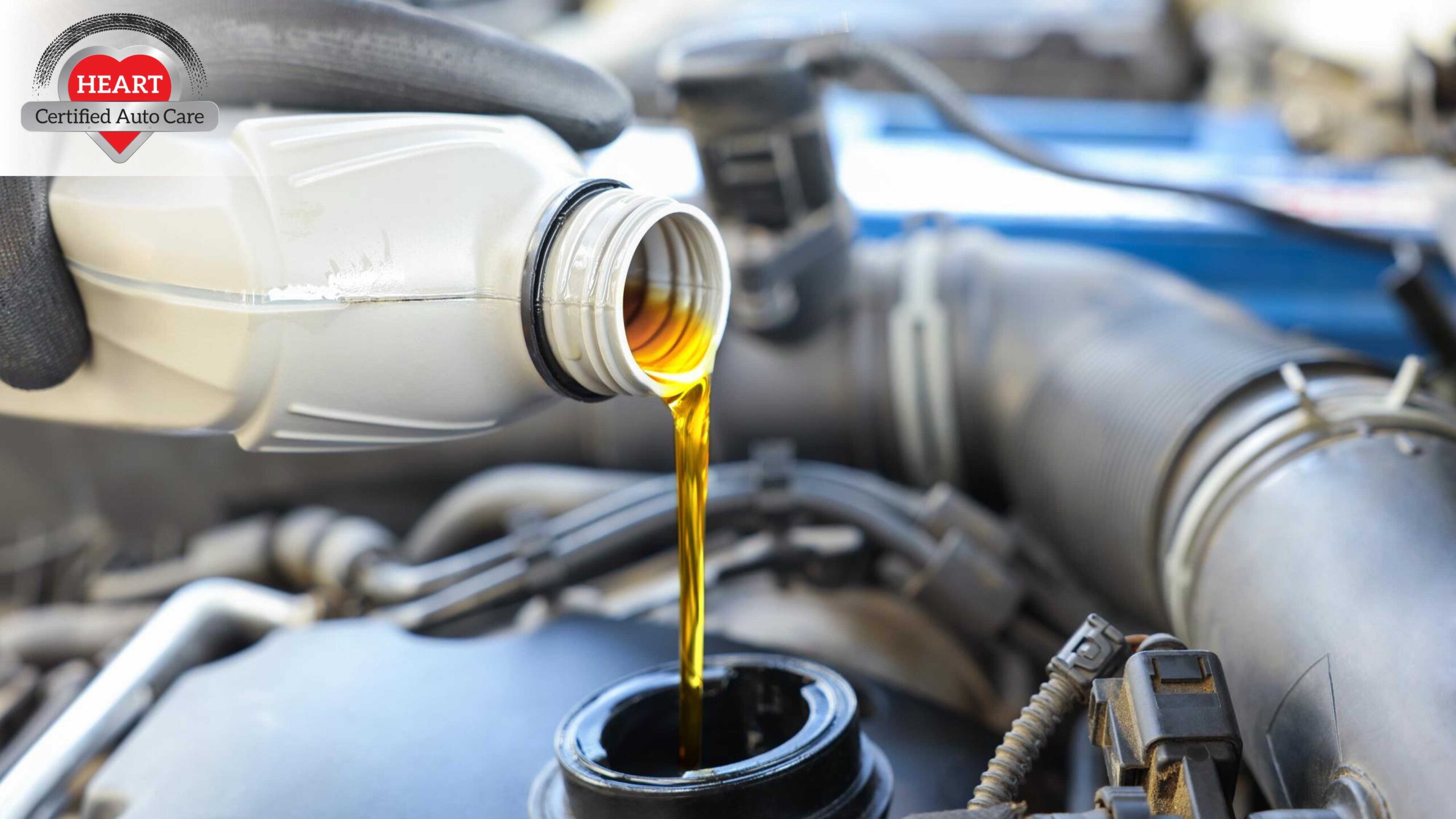 Technician performing oil change service in Bannockburn IL