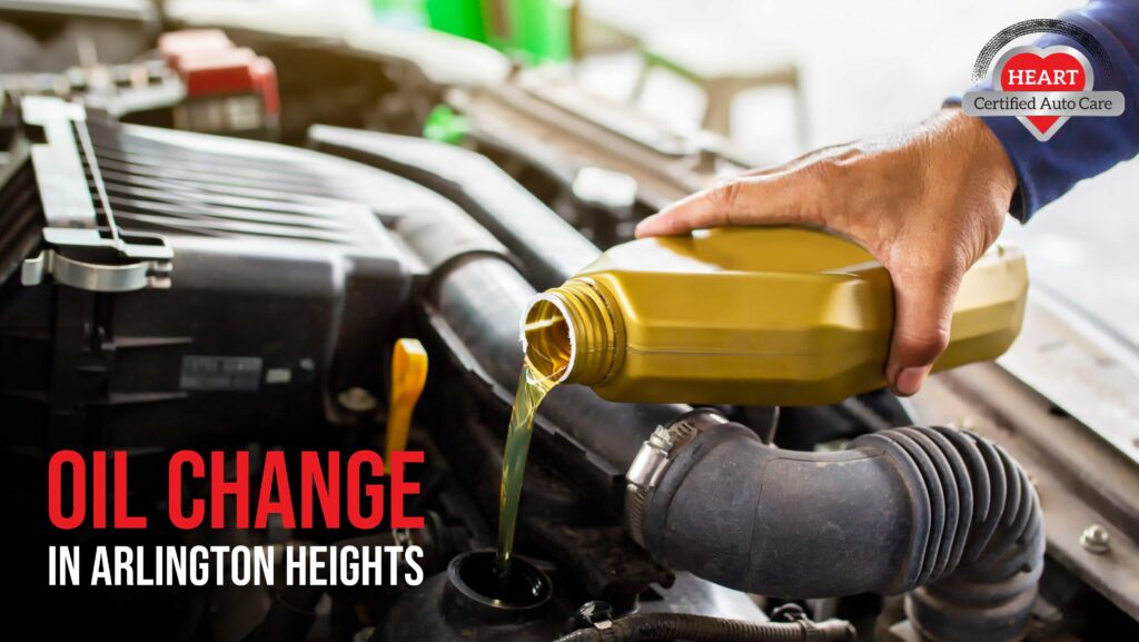 Oil change service being performed on SUV in Arlington Heights auto shop
