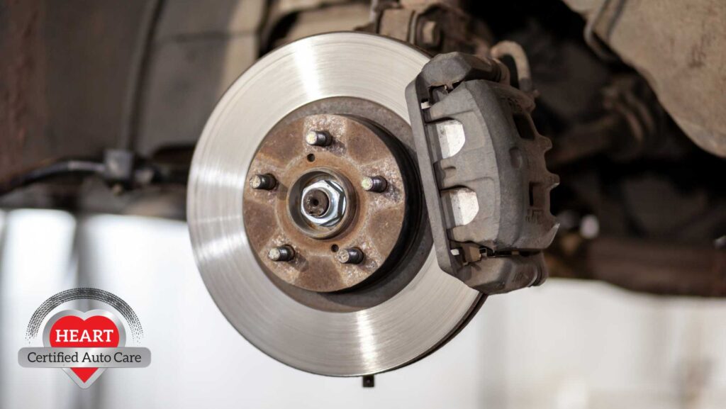 Mechanic inspecting soft brake pedal causes in Libertyville IL