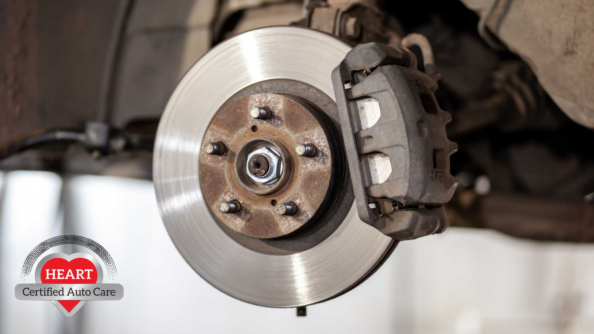 Mechanic inspecting soft brake pedal causes in Libertyville IL