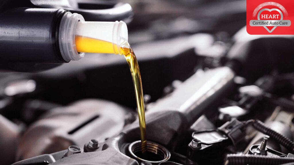 Technician performing synthetic oil change near Bannockburn IL